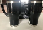 New In Box Sharper Image Heated Trael Mug 2-PACK. Price: $20.00.