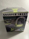 Sharper Image Portable Multifunction Wet & Dry Auto Vacuum With All Attachments Open. Price: $15.00.