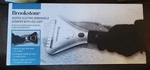 Brookstone Heated Electric Scraper With Led Light New. Price: $10.00.