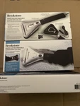 Brookstone Heated Electric Windshield Ice Scraper Sealed Nib New. Price: $11.39.