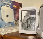 Mini Thermoelectric Cooler/warmer White A/c & Car Cord Home Travel Camping New Open. Price: $9.99.