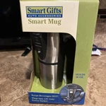 Smart Gifts Stainless Steel Auto Accessories Mug Plugs Into 12V New. Price: $20.00.