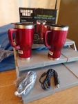 Sharper Image 2-PACK Red 14OZ Stainless Steel 12V Heated Travel Mug Set No Spill New. Price: $16.99.